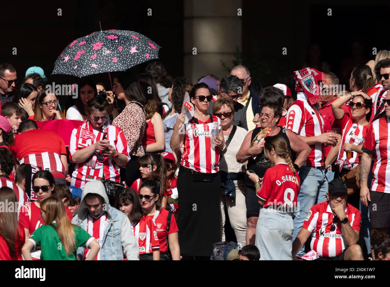 Bilbao, Biscay, Spain - April 11th 2024 - Athletic Club de Bilbao fans celebrate the 25th Copa del Rey title with the barge Stock Photo