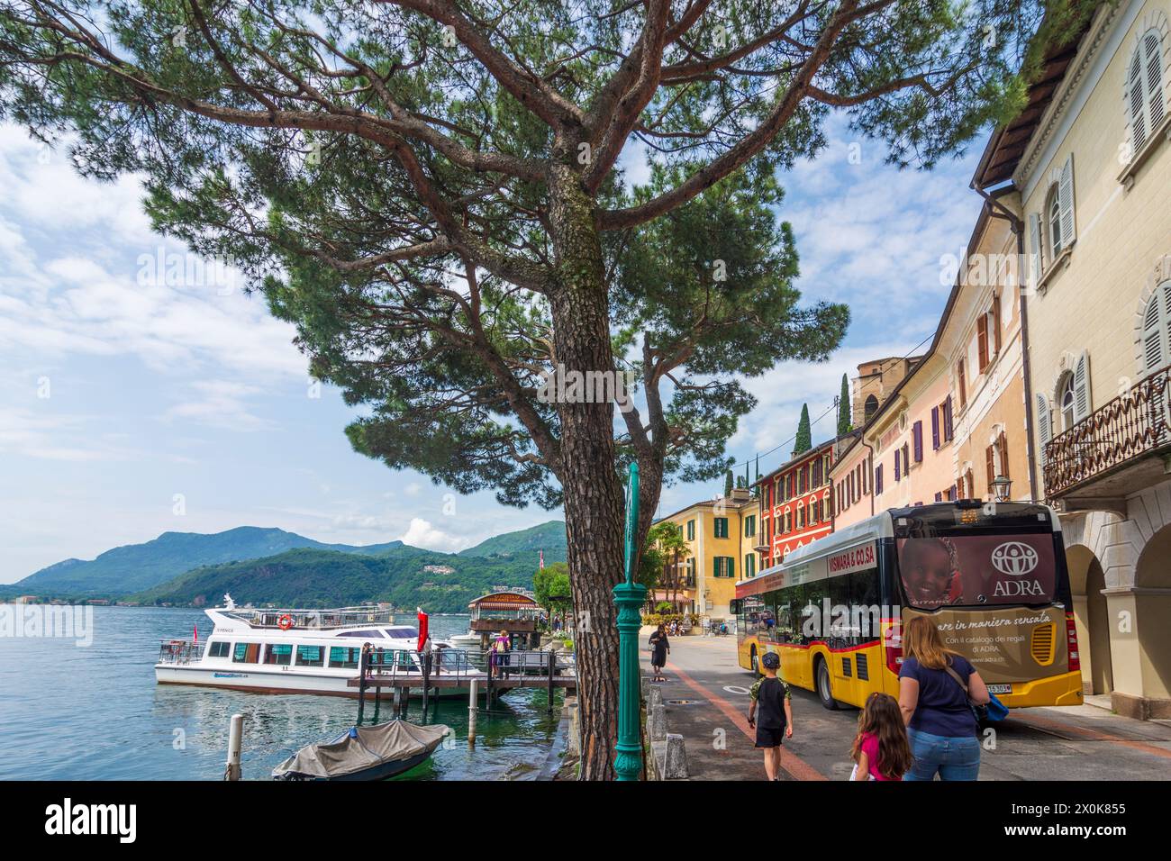 Morcote, Lake Lugano (Lago di Lugano), lakefront Morcote, passenger ship, bus Postbus in Lugano, Ticino, Switzerland Stock Photo