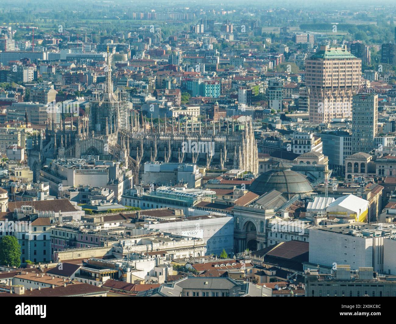 Aerial view of the Milan Cathedral. Duomo di Milano. Cathedral in white marble. Buttresses, pinnacles and spiers. Statue of the Madonnina. Italy Stock Photo