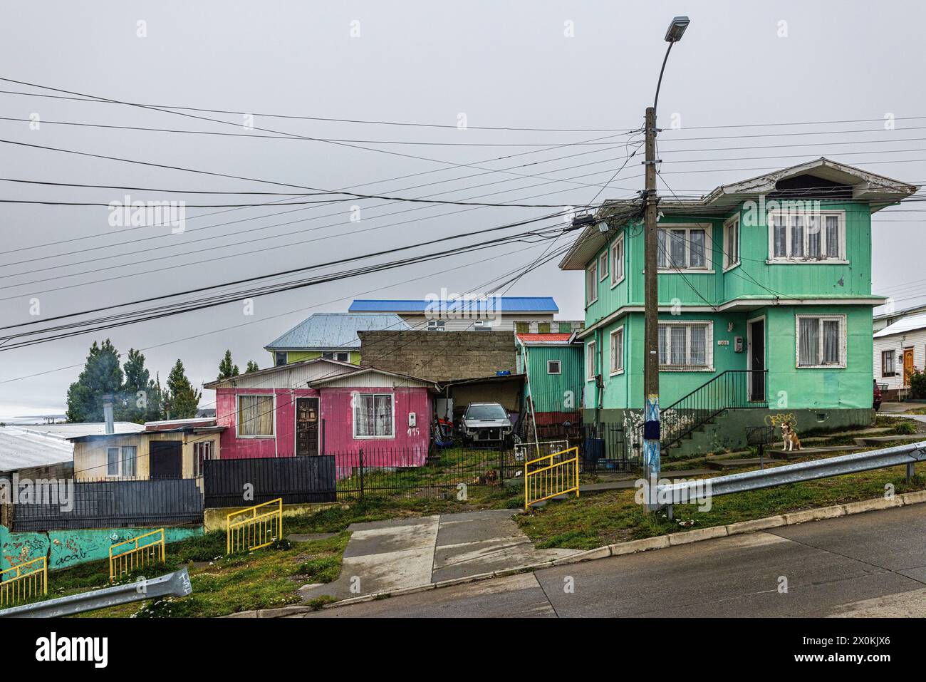 Colorful houses and street. Punta Arenas, Patagonia y la Antarctica Chilena, Chile. Stock Photo
