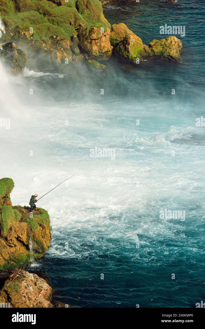Angler at Düden Waterfall, Lara, Antalya, Antalya Province, Turkey, Asia Stock Photo