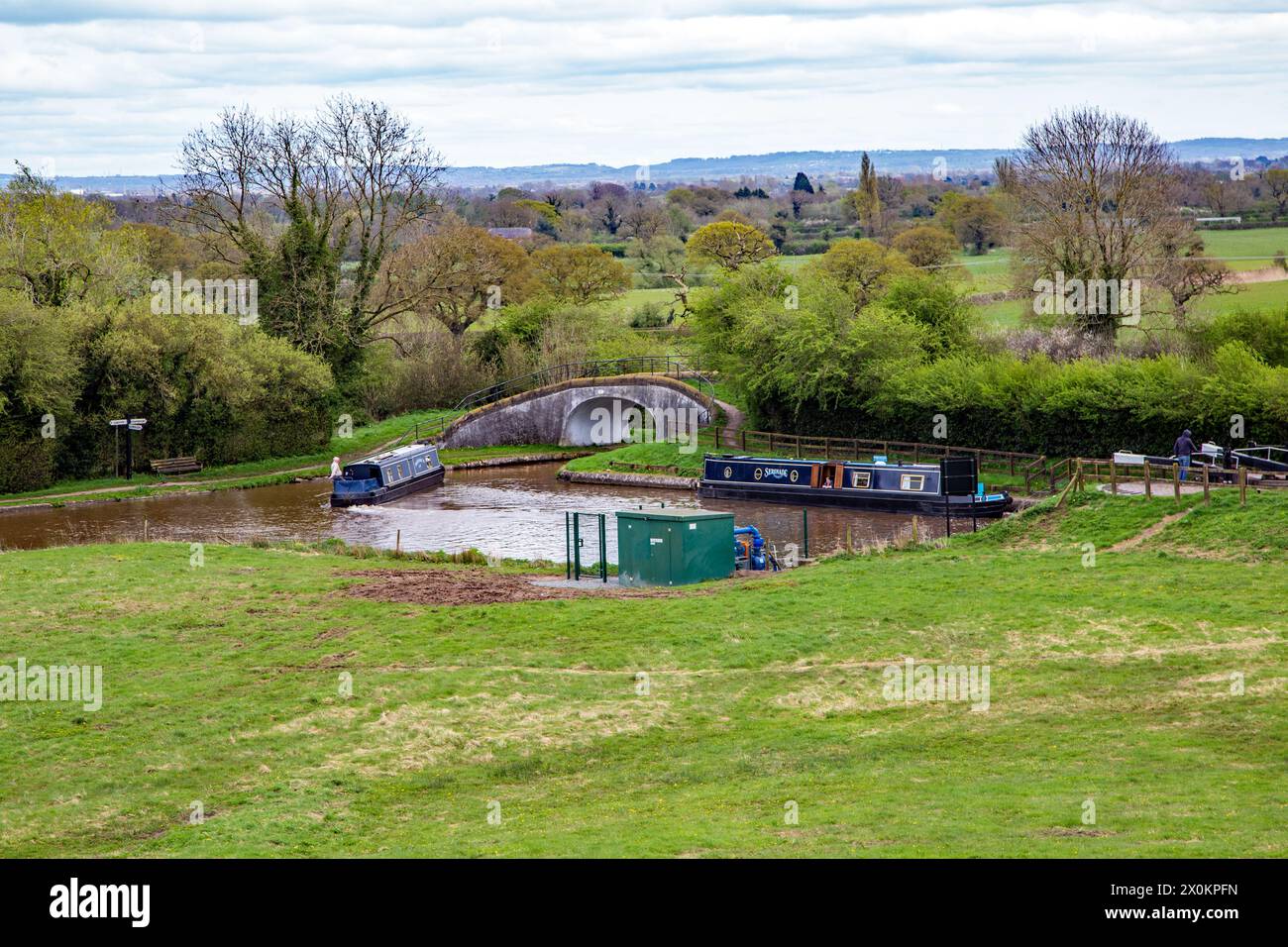 Canal narrowboats at the junction of the Shropshire union canal and the Llangollen canal at Hurleston junction near Nantwich Cheshire Stock Photo