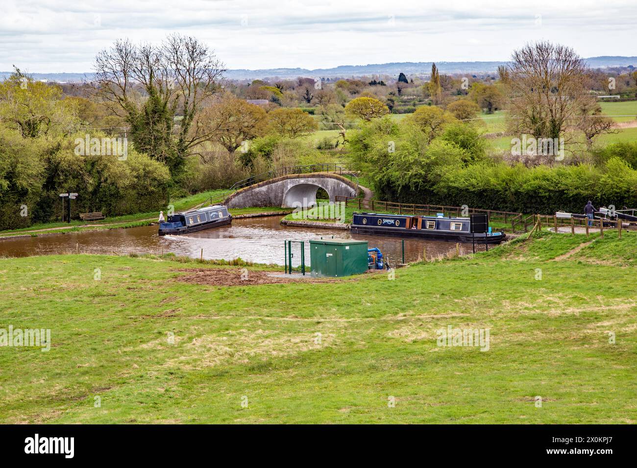 Canal narrowboats at the junction of the Shropshire union canal and the Llangollen canal at Hurleston junction near Nantwich Cheshire Stock Photo