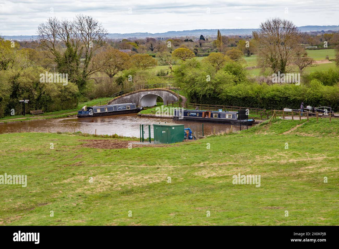 Canal narrowboats at the junction of the Shropshire union canal and the Llangollen canal at Hurleston junction near Nantwich Cheshire Stock Photo