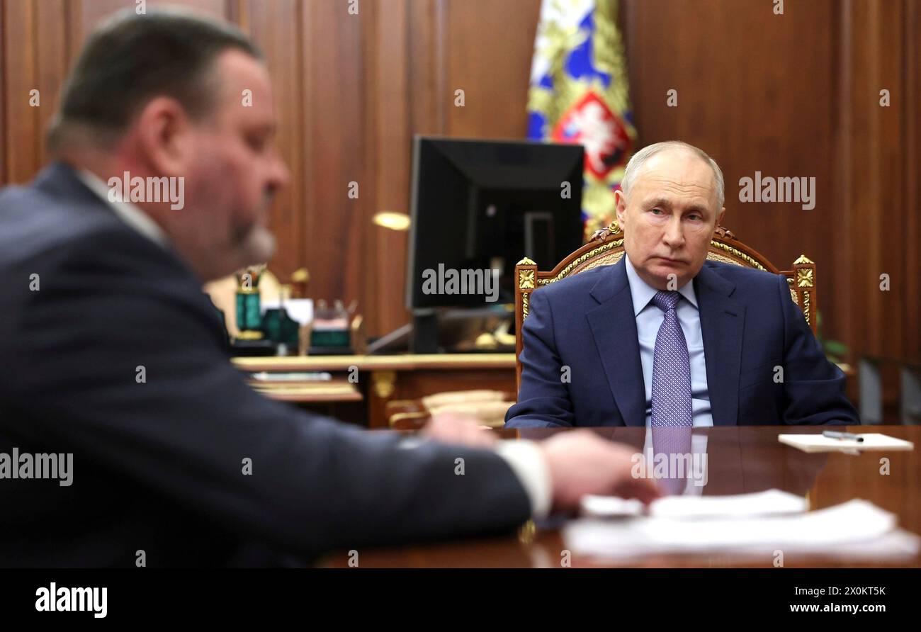 Moscow, Russia. 10th Apr, 2024. Russian President Vladimir Putin, right, listens to Minister of Labour and Social Protection Anton Kotyakov, left, during a face-to-face meeting at the Kremlin, April 10, 2024 in Moscow, Russia. Kotyakov explained efforts to develop a Social Treasury system for Russian citizens. Credit: Gavriil Grigorov/Kremlin Pool/Alamy Live News Stock Photo