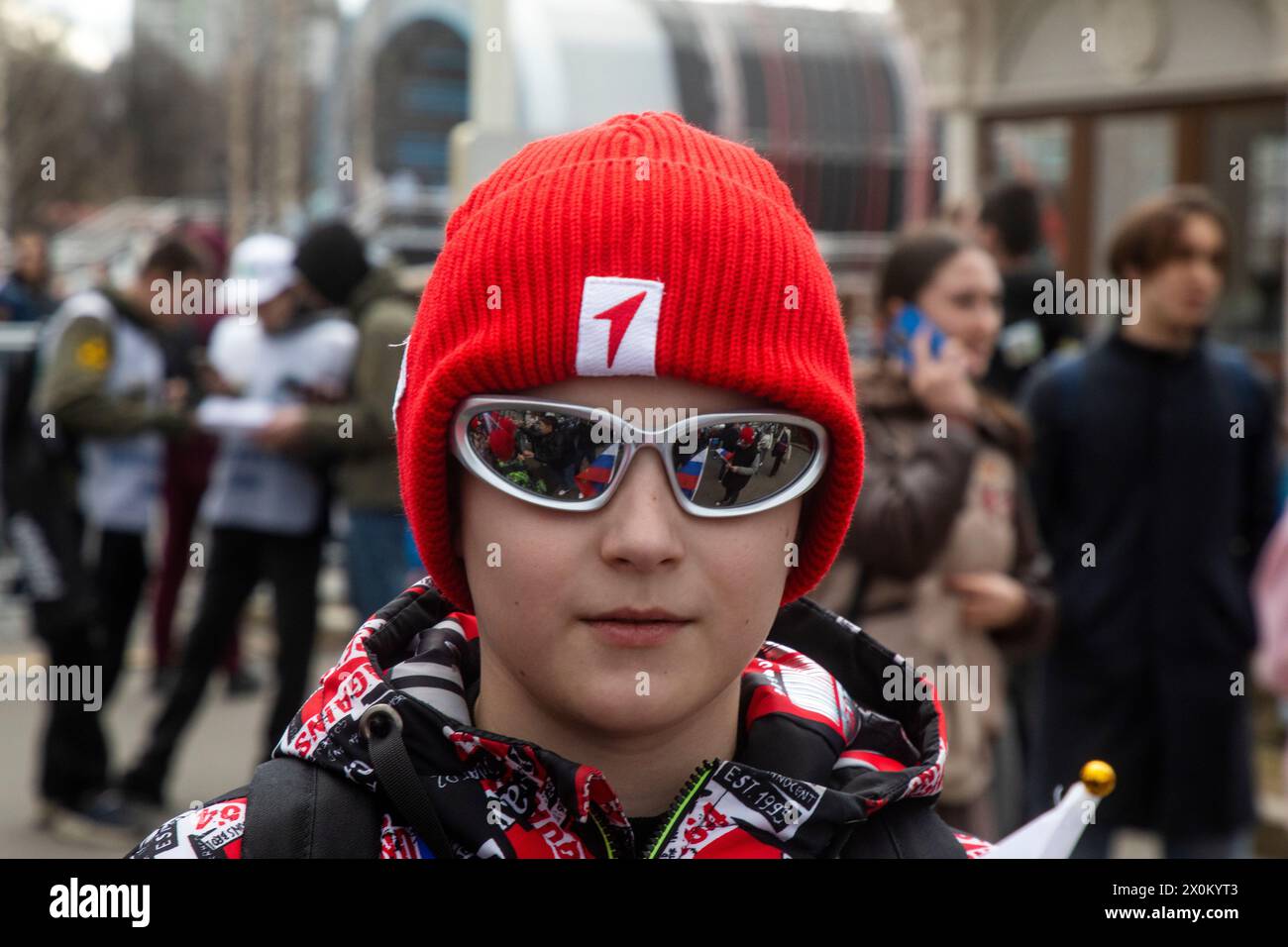 Moscow, Russia. 12th of April, 2024. A member of the Movement of the First takes part of celebration Cosmonautics Day during the Russia Expo international forum and exhibition at the VDNKh Exhibition Centre in Moscow, Russia. Credit: Nikolay Vinokurov/Alamy Live News Stock Photo