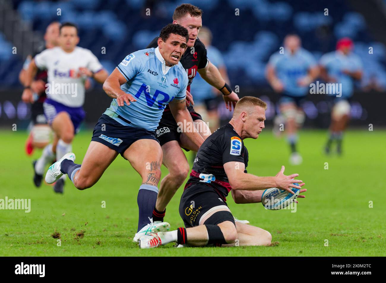 Sydney, Australia. 12th Apr, 2024. Johnny McNicholl of the Crusaders captures the ball during the Super Rugby Pacific 2024 Rd8 match between the Waratahs and the Crusaders at Allianz Stadium on April 12, 2024 in Sydney, Australia Credit: IOIO IMAGES/Alamy Live News Stock Photo