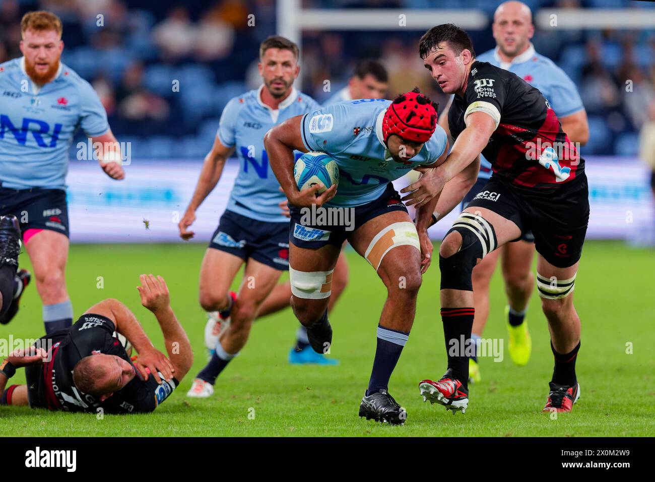 Sydney, Australia. 12th Apr, 2024. Langi Gleeson of the Waratahs is tackled during the Super Rugby Pacific 2024 Rd8 match between the Waratahs and the Crusaders at Allianz Stadium on April 12, 2024 in Sydney, Australia Credit: IOIO IMAGES/Alamy Live News Stock Photo