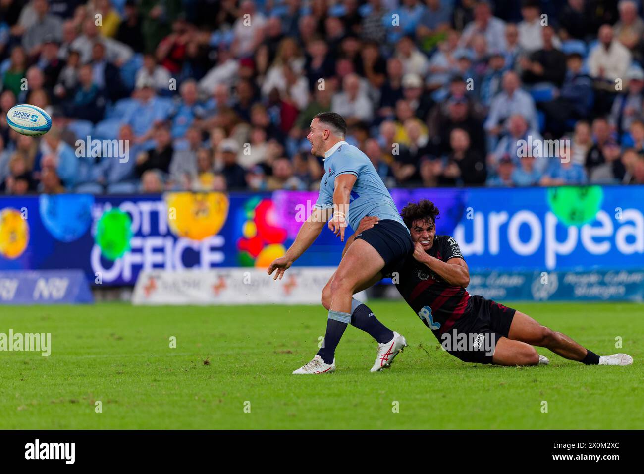 Sydney, Australia. 12th Apr, 2024. Dylan Pietsch of the Waratahs is tackled during the Super Rugby Pacific 2024 Rd8 match between the Waratahs and the Crusaders at Allianz Stadium on April 12, 2024 in Sydney, Australia Credit: IOIO IMAGES/Alamy Live News Stock Photo