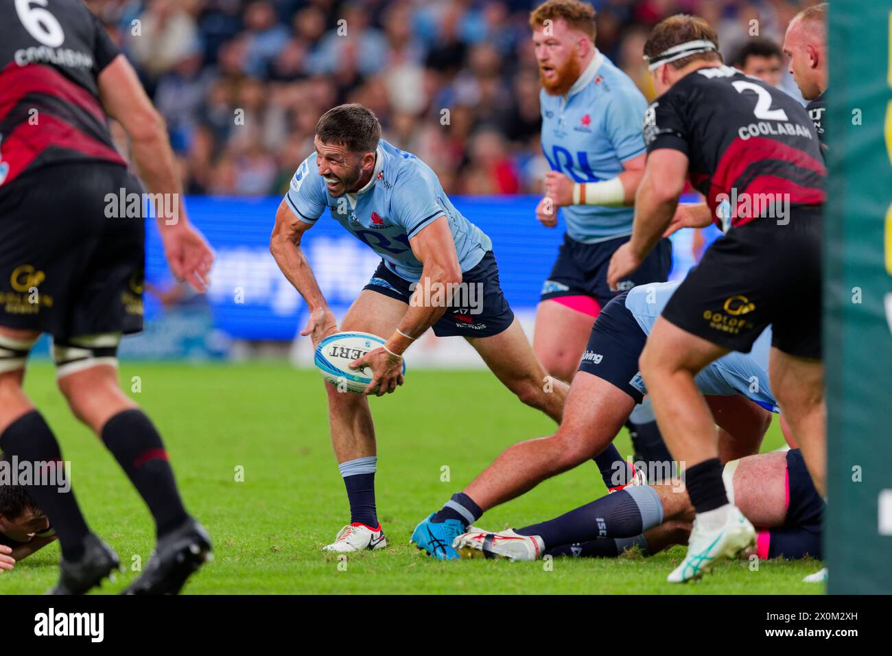 Sydney, Australia. 12th Apr, 2024. Jake Gordon of the Waratahs prepares to pass the ball during the Super Rugby Pacific 2024 Rd8 match between the Waratahs and the Crusaders at Allianz Stadium on April 12, 2024 in Sydney, Australia Credit: IOIO IMAGES/Alamy Live News Stock Photo