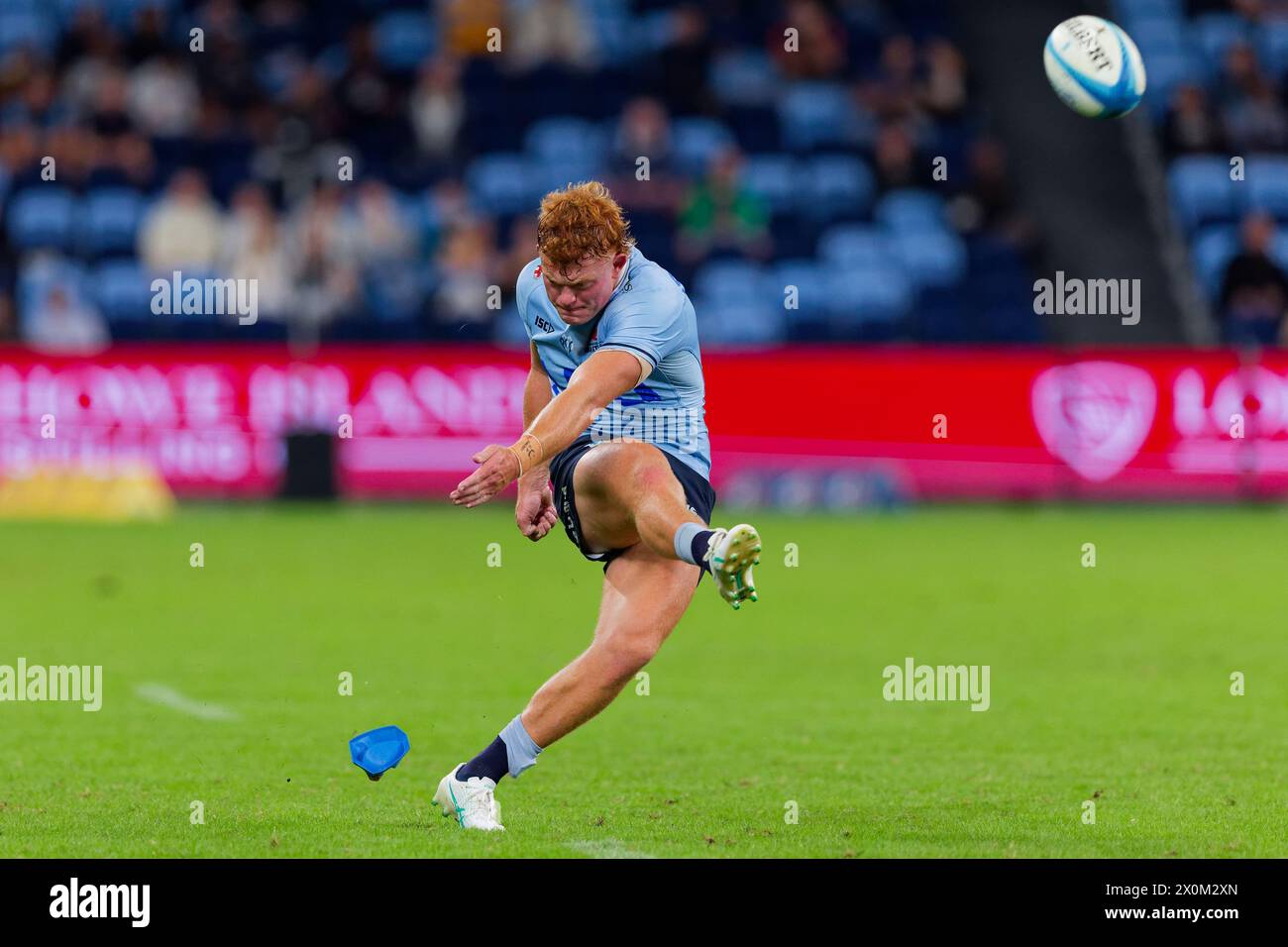 Sydney, Australia. 12th Apr, 2024. Tane Edmed of the Waratahs kicks at goals during the Super Rugby Pacific 2024 Rd8 match between the Waratahs and the Crusaders at Allianz Stadium on April 12, 2024 in Sydney, Australia Credit: IOIO IMAGES/Alamy Live News Stock Photo
