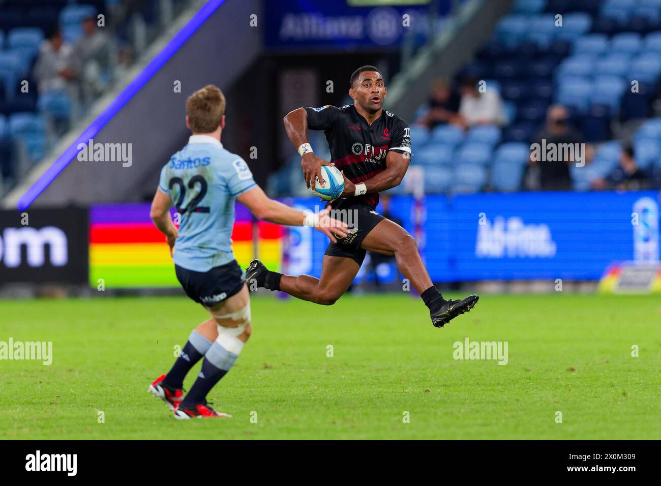 Sydney, Australia. 12th Apr, 2024. Sevu Reece of the Crusaders runs with the ball during the Super Rugby Pacific 2024 Rd8 match between the Waratahs and the Crusaders at Allianz Stadium on April 12, 2024 in Sydney, Australia Credit: IOIO IMAGES/Alamy Live News Stock Photo