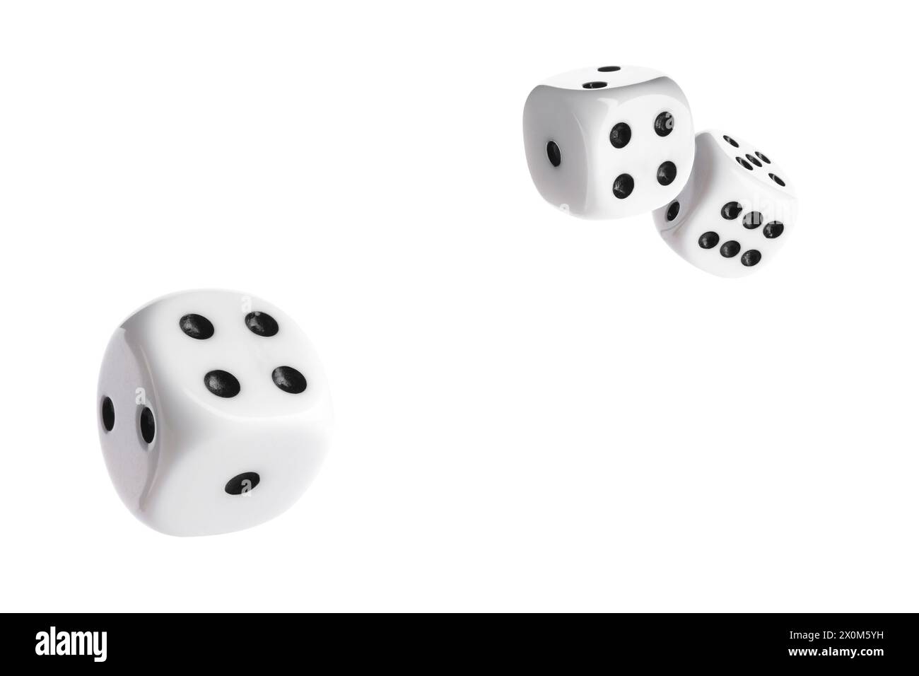 Three dice in air on white background Stock Photo