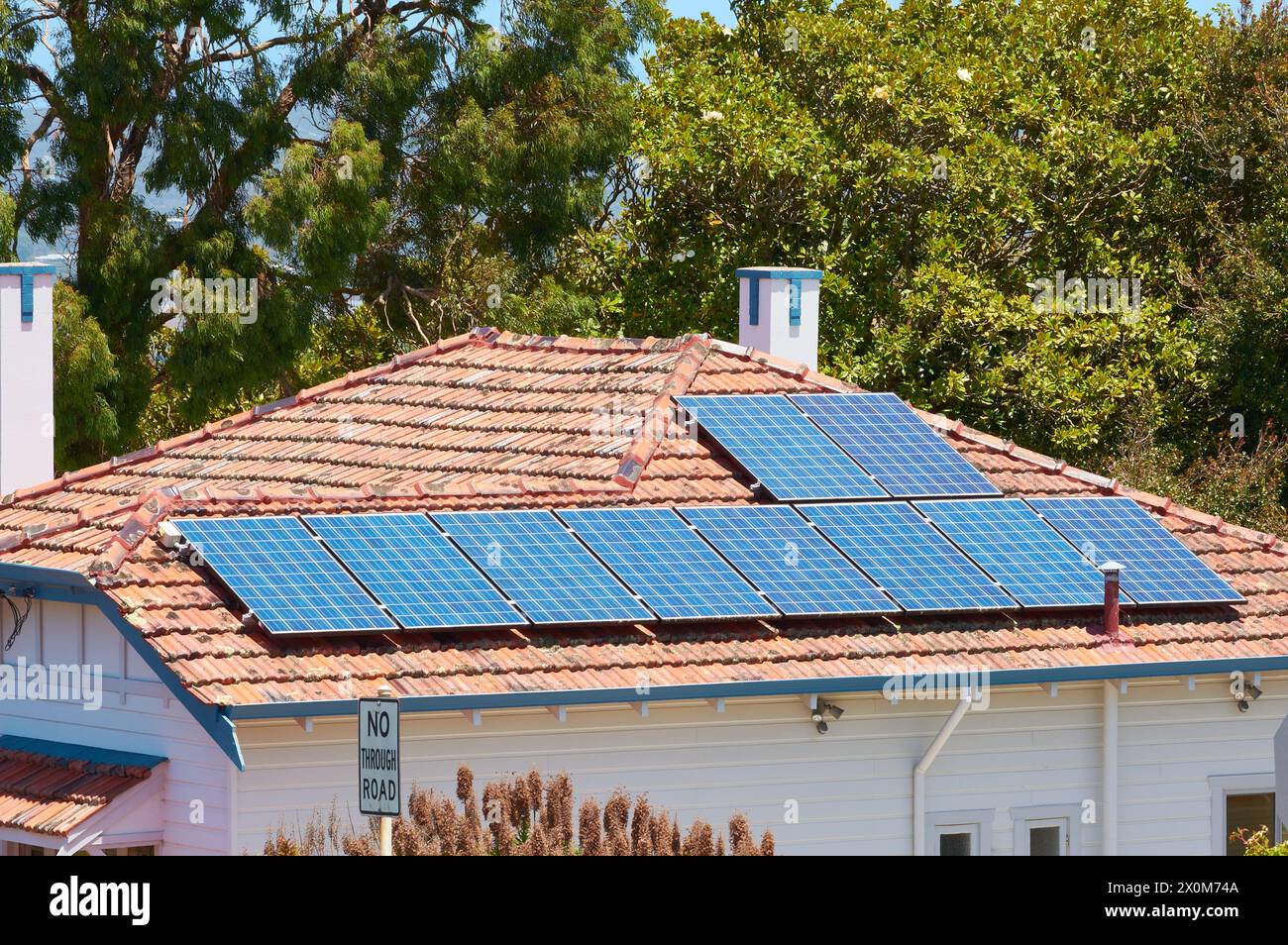 Solar panels on the tiled roof of an Australian residential home in the town of Albany, Western Australia. Stock Photo