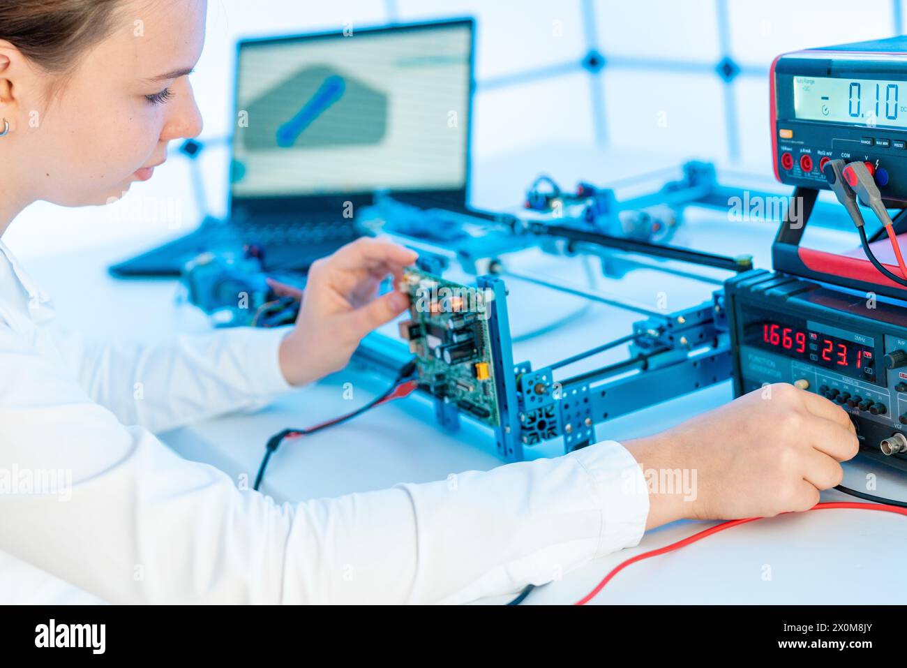 Student in physics laboratory. Stock Photo