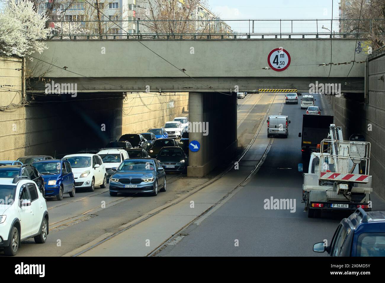 Bucharest, Romania. 18th March, 2024: Car traffic under the Constanta Bridge on Calea Grivitei in Bucharest. Stock Photo