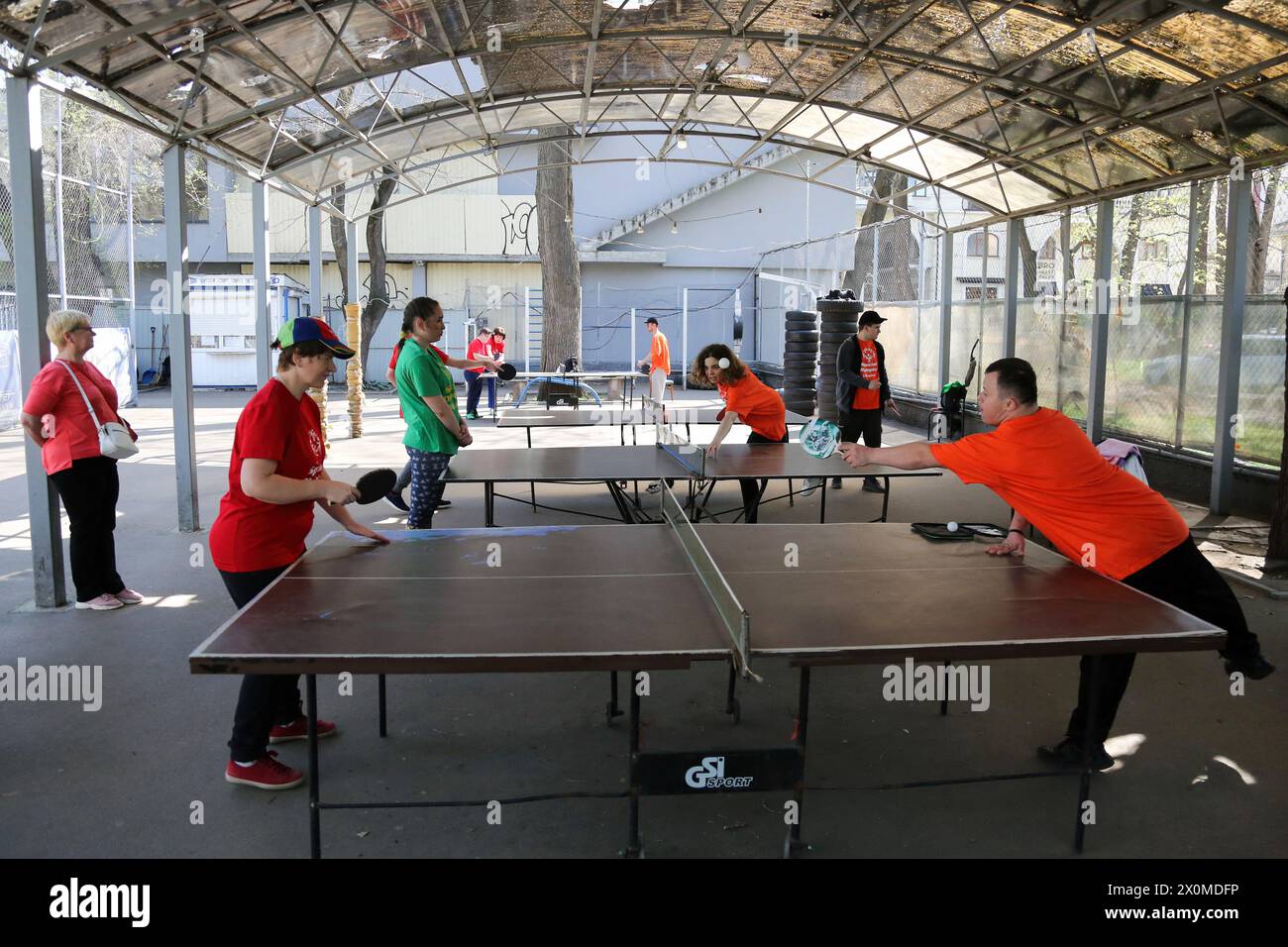 People with special needs play table tennis at Starobazarny Square. Despite  the ongoing war with the Russian Federation, the GO 