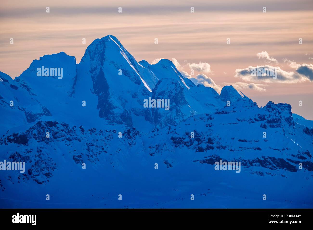 The snow-covered summits of Piccolo Vernel, Gran Vernel and Roda de ...