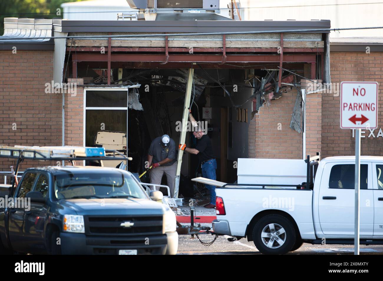 Mandatory Credit: Photo by Reginald Mathalone/NurPhoto/Shutterstock (14433071r)Cleanup and crime scene documentation efforts are continuing throughout the day at the Texas Department of Public Safety building in Brenham, Texas. Man Intentionally Drives Stolen 18-Wheeler Into Texas DPS Building Killing 1 And Injuring 13, Brenham, Texas, United States - 12 Apr 2024 Stock Photo