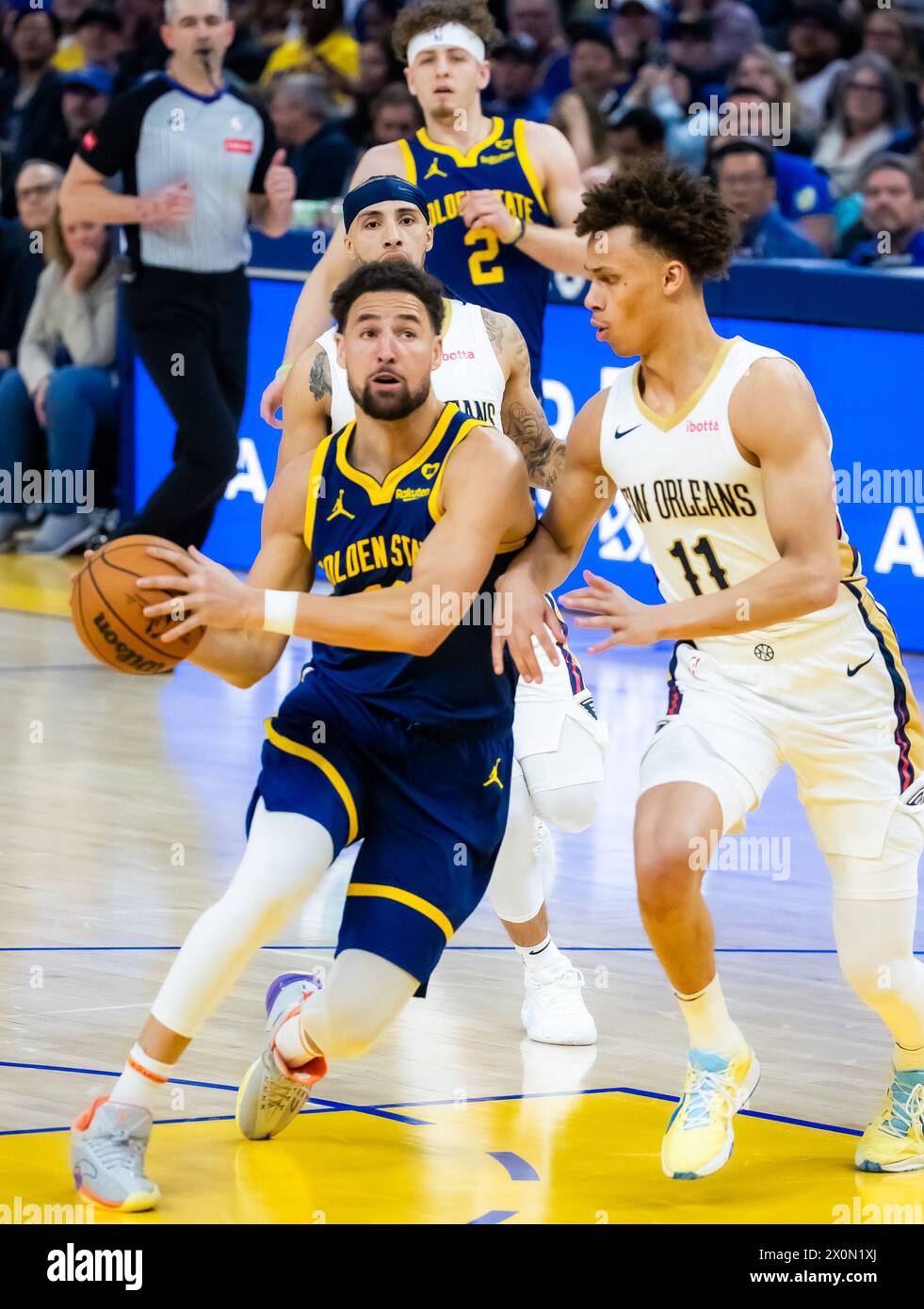 San Francisco, USA. 12th Apr, 2024. Klay Thompson (Front, L) of Golden State Warriors competes during the NBA regular season game between Golden State Warriors and New Orleans Pelicans in San Francisco, the United States, April 12, 2024. Credit: Dong Xudong/Xinhua/Alamy Live News Stock Photo