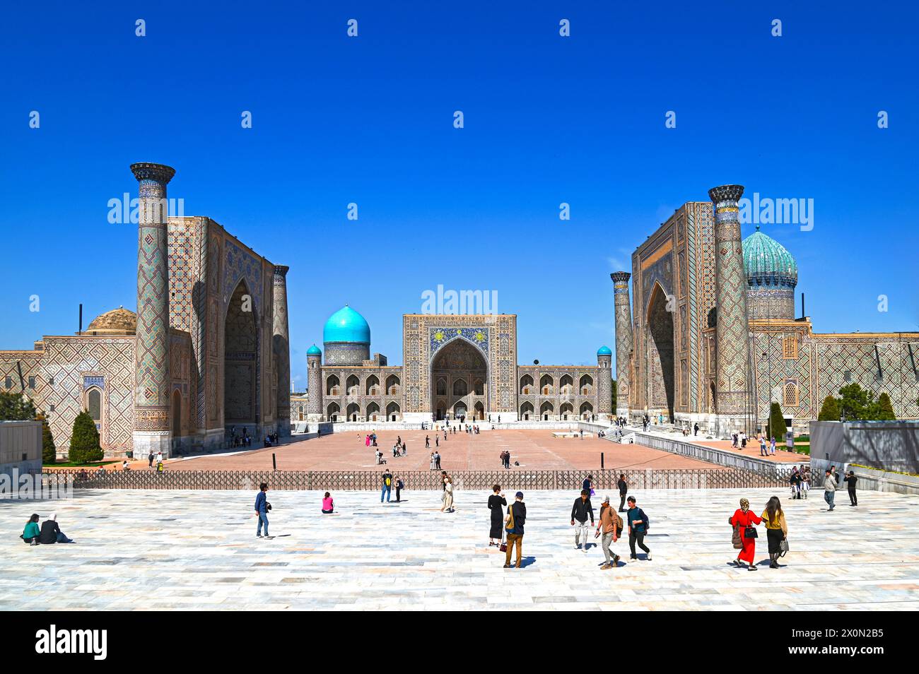 SAMARKAND - MAR 27: Three madrasas at the Registan of Samarkand, built during the Timurid Renaissance on March 27. 2024 in Uzbekistan Stock Photo
