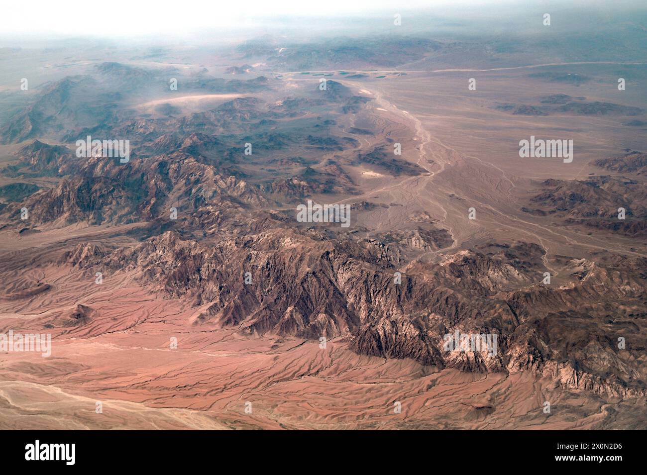 Amazing landscape of Iran or Persia with sandy valleys, hills, mountains Stock Photo
