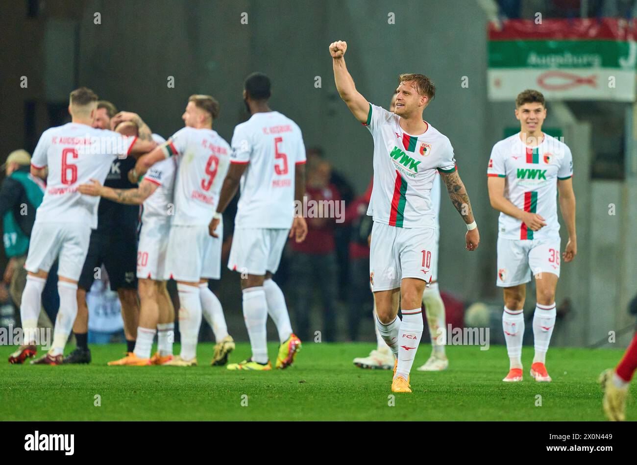 celebration 2-0 goal, happy, laugh, celebration, of Sven Michel, FCA 20  in the match FC AUGSBURG - 1. FC Union Berlin 2-0  on Apr 12, 2024 in Augsburg, Germany. Season 2023/2024, 1.Bundesliga, FCA, matchday 29, 29.Spieltag Photographer: ddp images / star-images    - DFL REGULATIONS PROHIBIT ANY USE OF PHOTOGRAPHS as IMAGE SEQUENCES and/or QUASI-VIDEO - Stock Photo