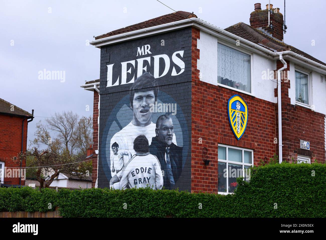 Leeds, UK. 13th Apr, 2024. A house outside of Elland Road, home of Leeds United during adorned with a Leeds United mural and club badge prior to the Leeds United FC v Blackburn Rovers FC sky bet EFL Championship match at Elland Road, Leeds, England, United Kingdom on 13 April 2024 Credit: Every Second Media/Alamy Live News Stock Photo