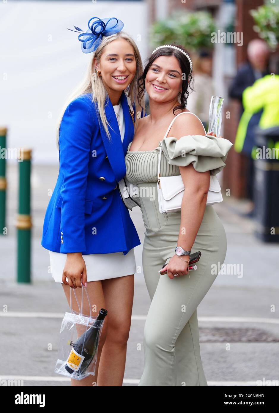 Racegoers on day three of the 2024 Randox Grand National Festival at Aintree Racecourse, Liverpool. Picture date: Saturday April 13, 2024. Stock Photo