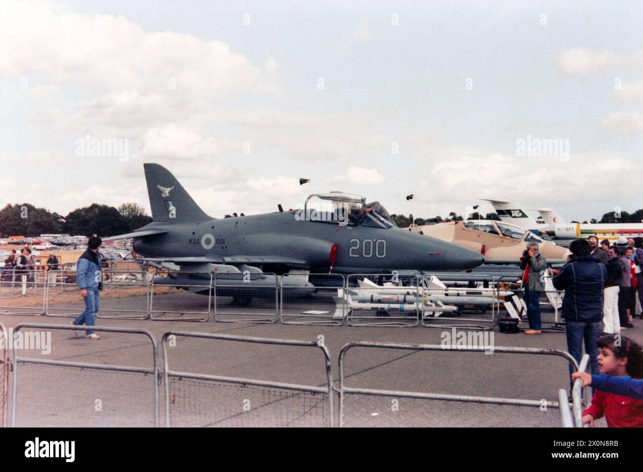 British Aerospace Hawk 200 mock-up serial KSS-001, full-scale mock-up for the Hawk 200 displayed at Farnborough International Airshow 1984 with an array of possible stores. The Hawk 200 was a development of a combat-orientated variant of the Hawk trainer aircraft, with the first flying in 1986 and entered service with first customer Royal Air Force of Oman in 1993 Stock Photo