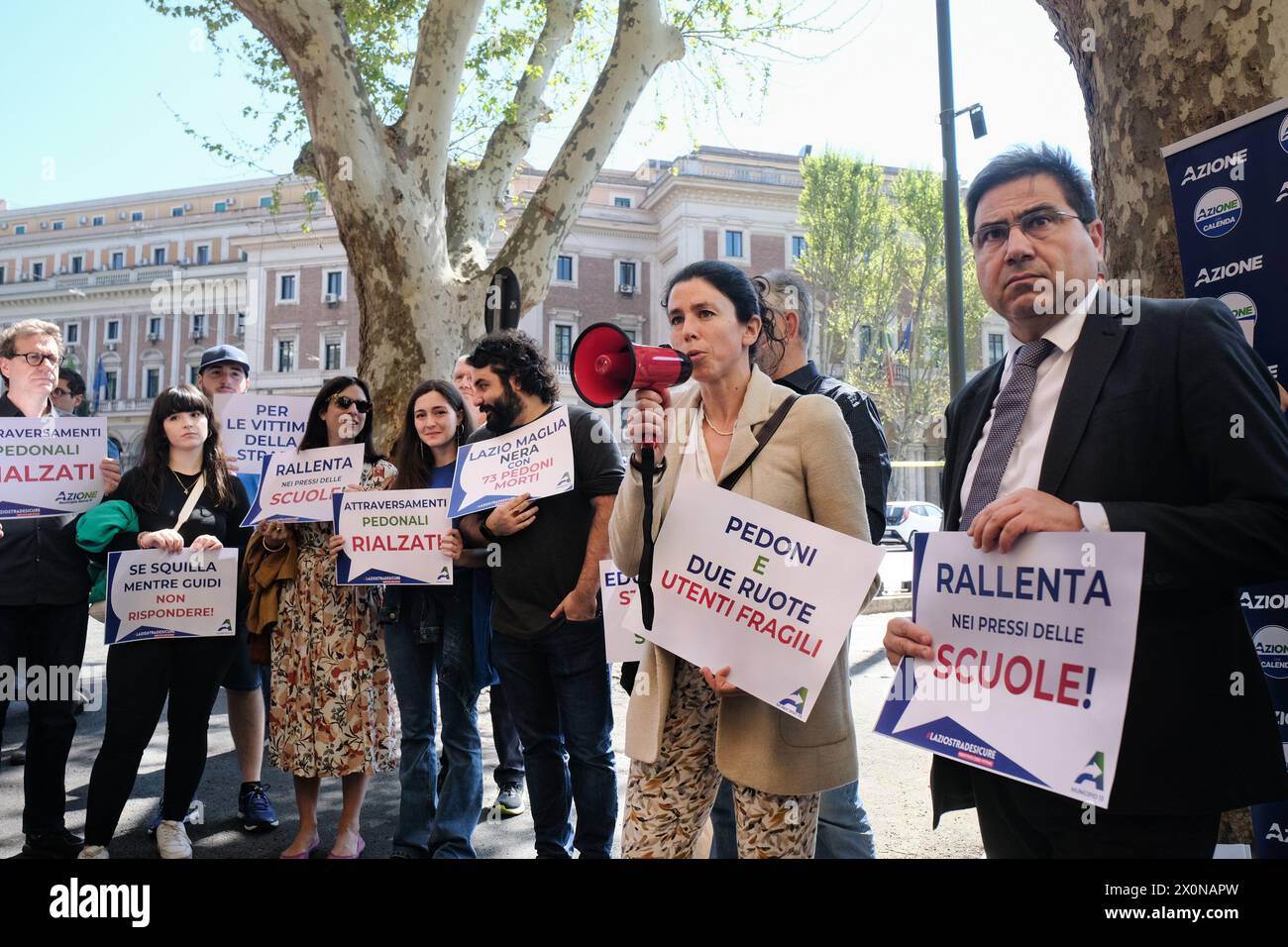 la deputata Giulia Pastorella, il Consigliere regionale e promotore della proposta di legge Lazio Strade Sicure, Alessio D'Amato in occasione del sit in di protesta, organizzato da Azione contro la nuova riforma del codice della Strada davanti alla sede del ministero delle Infrastrutture e dei trasporti a Roma, Sabato, 13 Aprile 2024 (foto Mauro Scrobogna/LaPresse) the deputy Giulia Pastorella, the regional councilor and promoter of the Lazio Safe Roads law proposal, Alessio D'Amato on the occasion of the sit-in protest, organized by Action against the new reform of the Highway Code in f Stock Photo