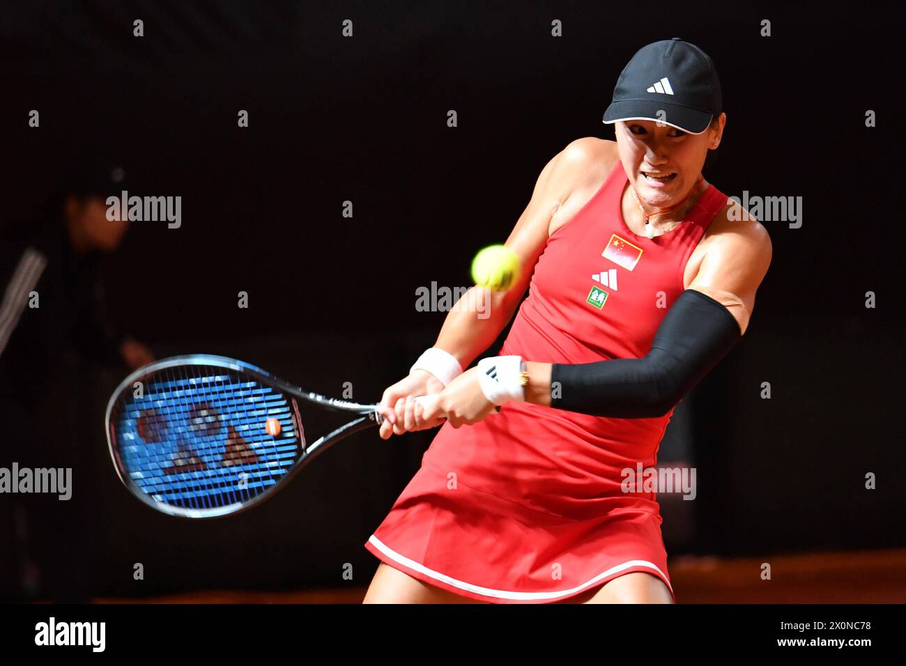 Changsha, China's Hunan Province. 13th Apr, 2024. Wang Xiyu of China hits a return during the women's singles match against Park Sohyun of South Korea at the Billie Jean King Cup 2024 tennis tournament Asia-Oceania Group I match in Changsha, central China's Hunan Province, April 13, 2024. Credit: Chen Zhenhai/Xinhua/Alamy Live News Stock Photo