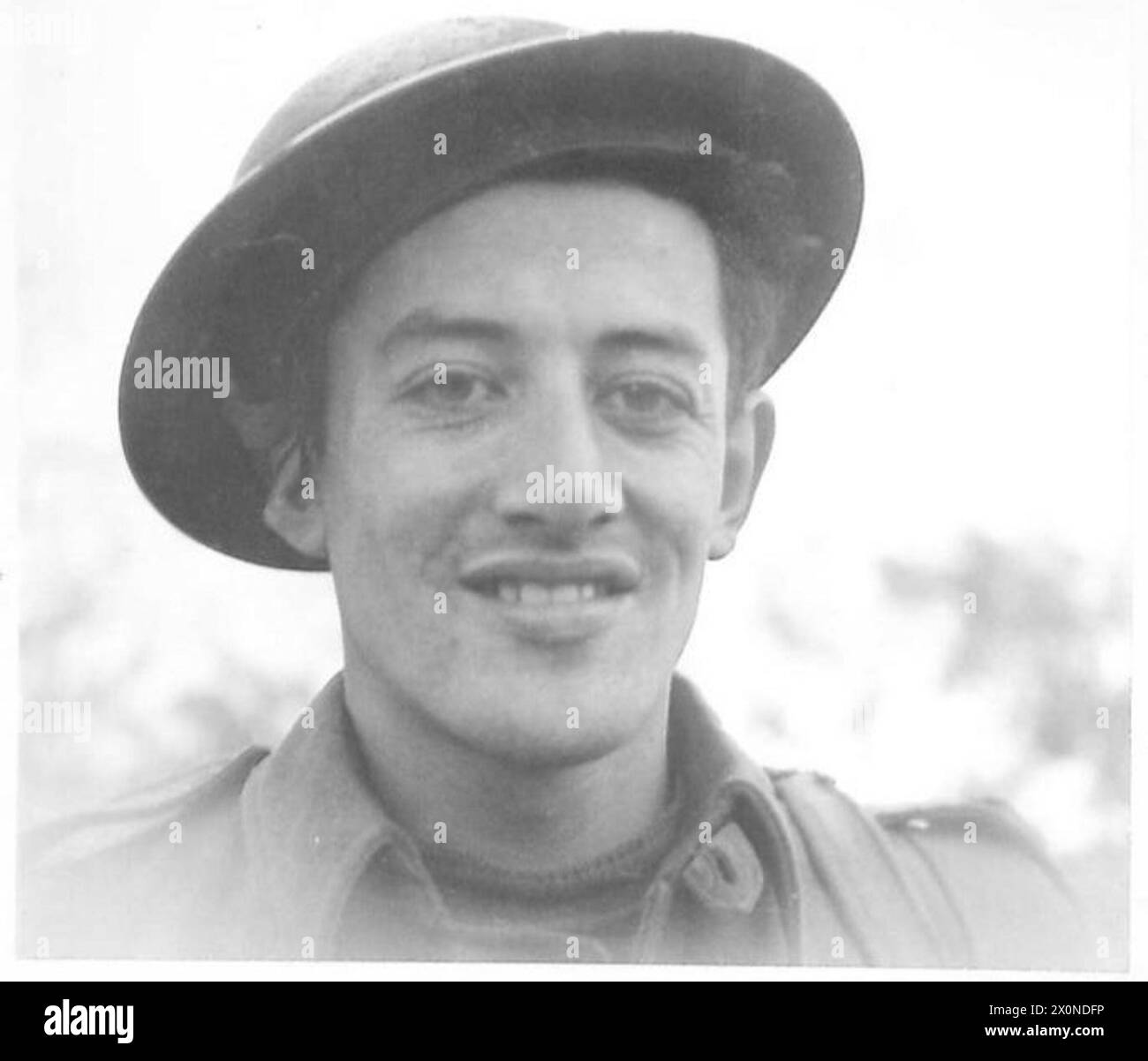 ITALY : FIFTH ARMYSPOT LIGHT ON THE KIWIS - A Maori Infantryman - Pte. Paul Pottiki, a 25 year old man from Setoun, Wellington, N.Z. Formerly a civil servant and played rugby for Peneke, represented Killbimie at cricket 'We can and will do it'. Photographic negative , British Army Stock Photo