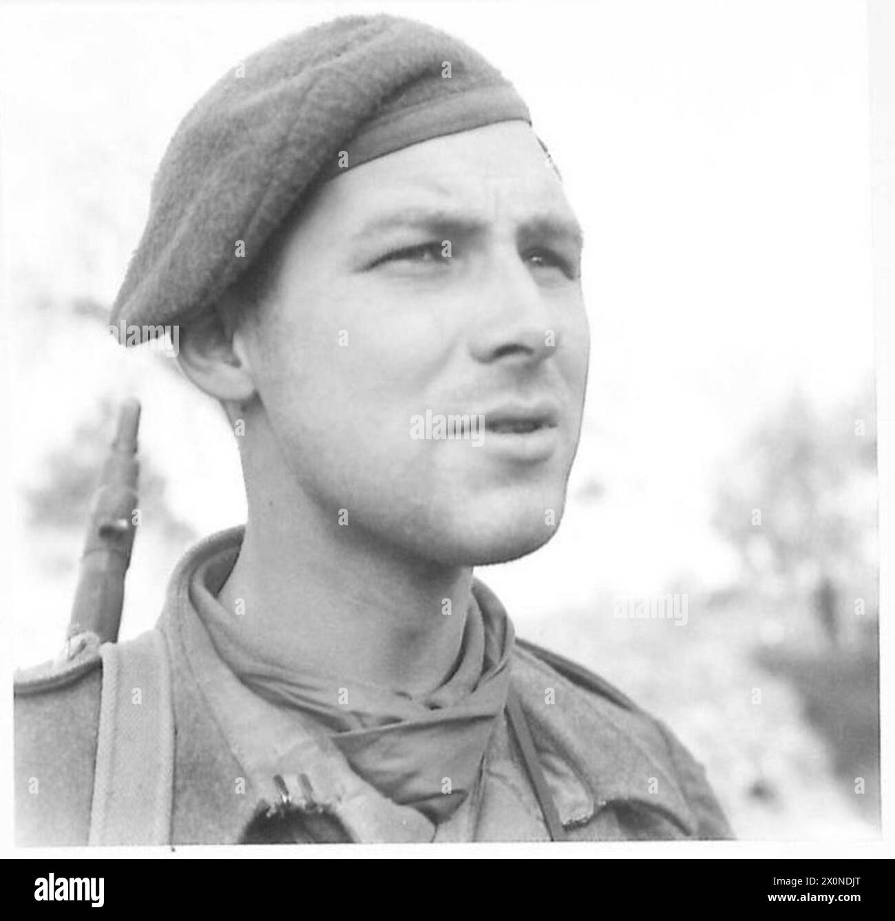 ITALY : EIGHTH ARMY ENTRY INTO ORTONA - 21-year old Lieut. E.M. Johnson, the young leader of the Scouts of the Edmonton Regiment, who had just come out of the town of Ortona with latest reports of the situation. Photographic negative , British Army Stock Photo