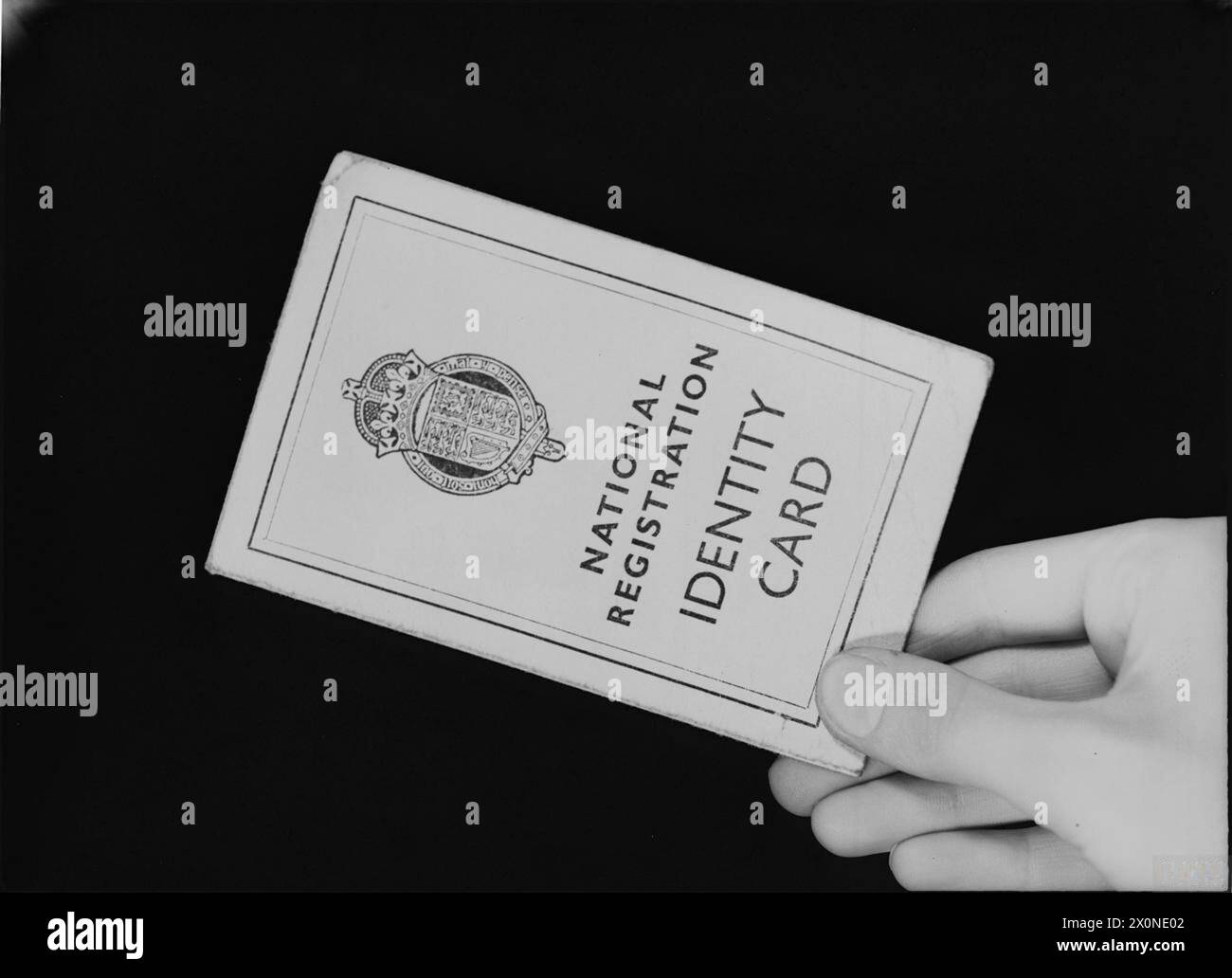 The image shows the exterior of a National Registration Identity Card ...