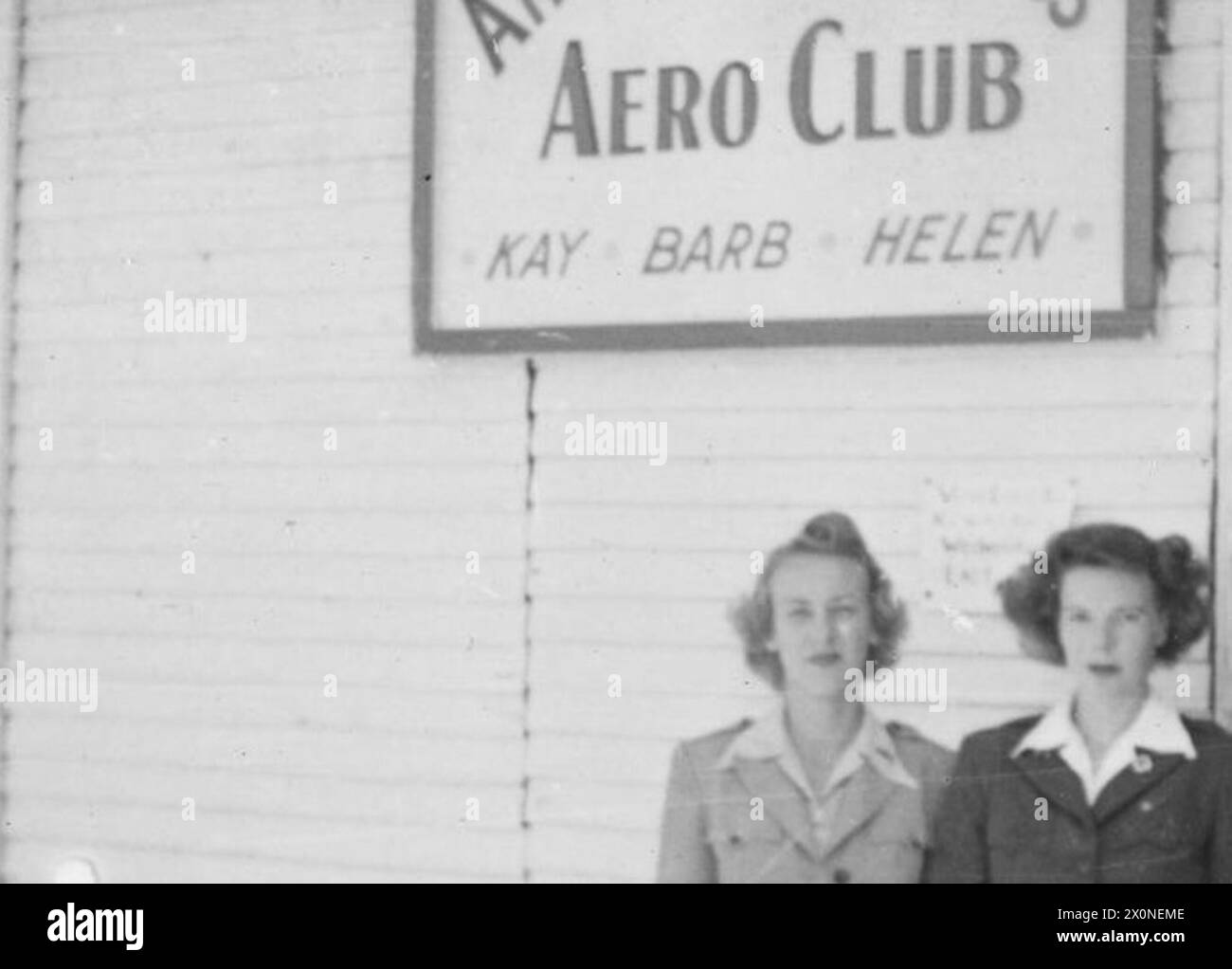 Helen Ormiston and Barbara Jaegar at the American Red Cross Aero Club in Achiet-le-Grand, northern France, on 29 July 1945, marking the closing day of B.54 during World War II. Stock Photo