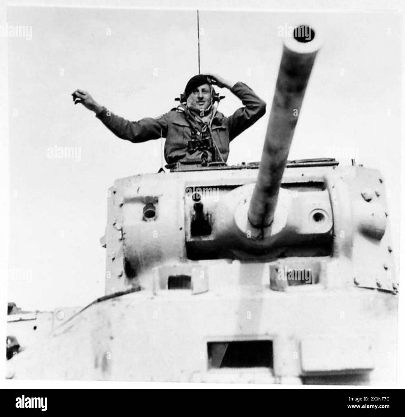 Commandeered A Tank A tank commander signals his crew to move off, coordinating with other ...
