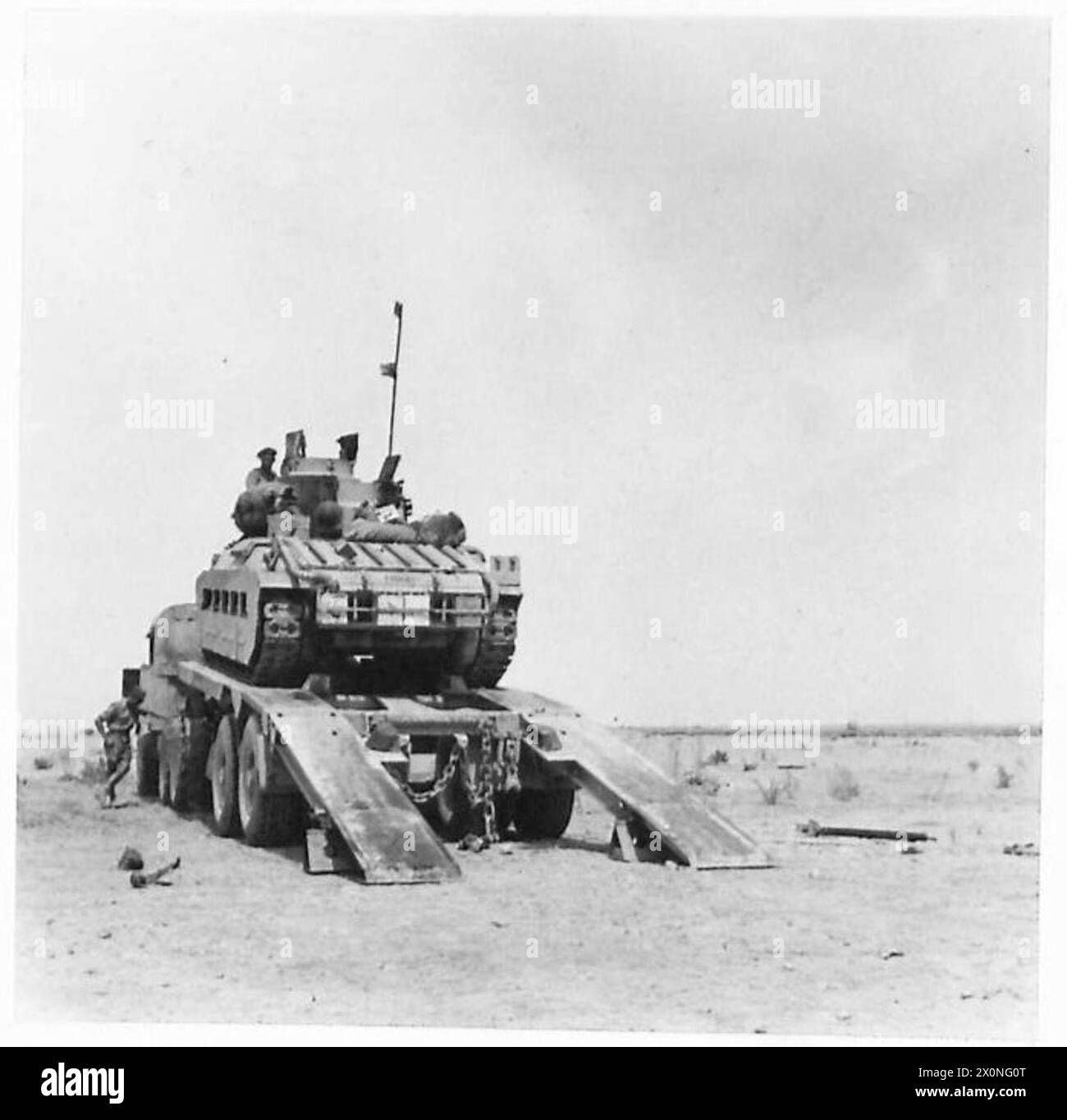 British Army tanks are transported on carriers to the front line in the ...