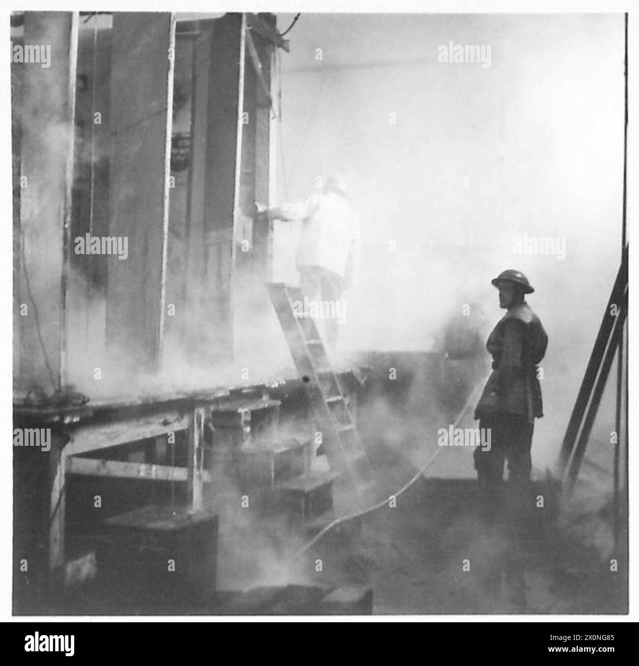 THE BRITISH ARMY IN NORTH AFRICA, SICILY, ITALY, THE BALKANS AND AUSTRIA 1942-1946 - When fire broke out in the concert hall of 5 Corps Workshops on Boxing Day, many weeks of hard work were destroyed in a few minutes. The Unit had intended to put on the pantomime 'Aladdin'. Photographic negative , British Army Stock Photo