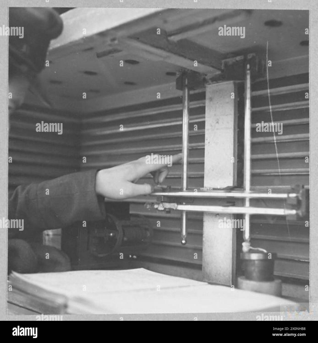 W.A.A.F. meteorologists in the Royal Air Force perform the groundwork ...