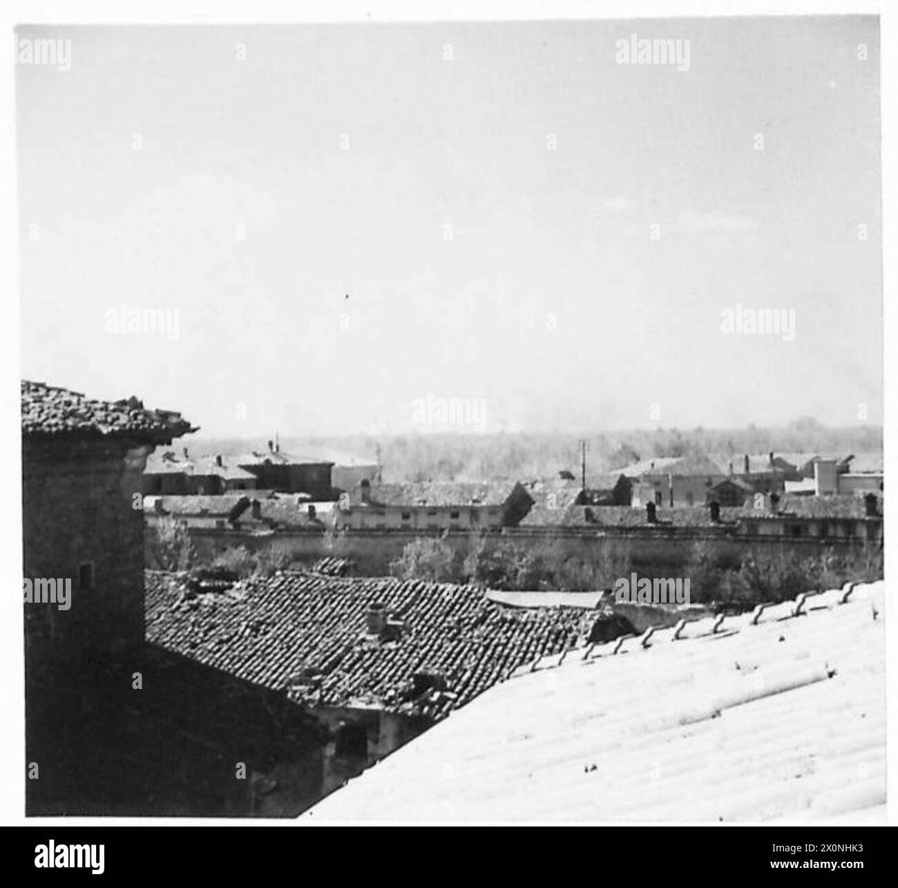 Photograph showing carpet bombing by Fortresses over the River Senio, with Eighth Army troops temporarily withdrawn to a safety line during the attack. Stock Photo