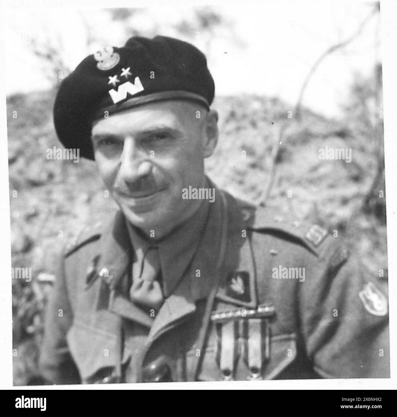 ALLIED ARMIES IN THE ITALIAN CAMPAIGN, 1943-1945 - Portrait of smiling General Władysław Anders, the CO of the 2nd Polish Corps. Photograph taken during General's visit to the British 78th Infantry Division at Cervaro (near Cassino) British Army, Polish Army, Polish Armed Forces in the West, Polish Corps, II, 78th Infantry Division, British Army, 8th Army, Anders, Władysław Stock Photo