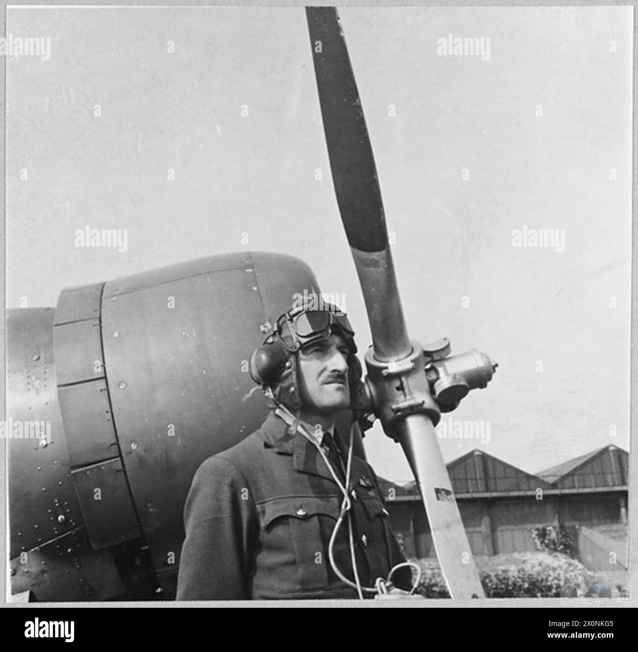 Lilly Pilot Flight Lieutenant G.E. Lillywhite, AFM, from Hove, Sussex, instructs ...