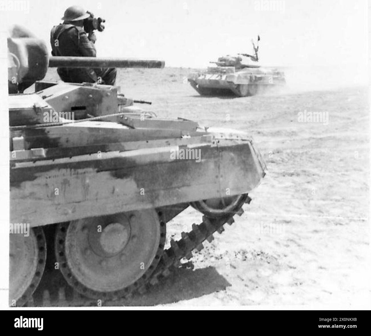The Army Film and Photographic Unit captures images of a tank moving to ...