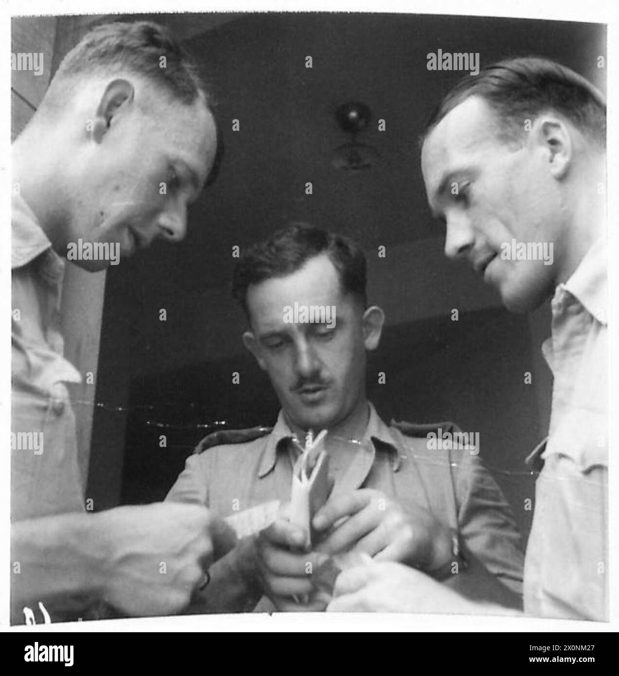 AFRICAN TROOPS QUALIFY FOR MINISTRY (8TH ARMY) - Left to right:- Lieut ...