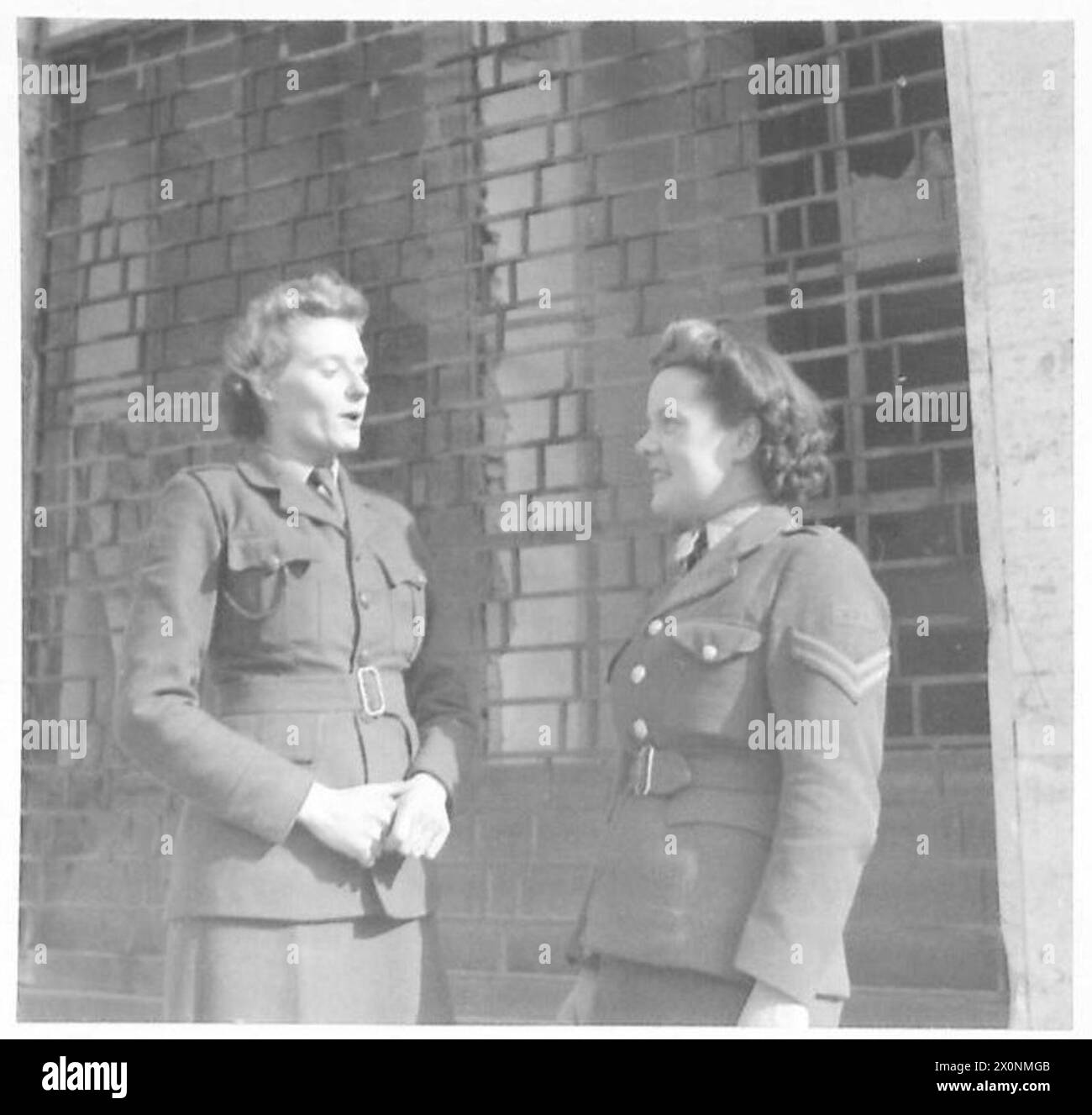 ITALY : OBSERVER STORY - Left to right:- Pte. Hazel Bernett of Wombwell, near Barnsley, Yorks., Cpl. Molly McCarthy, 18 Buxton Road, Newbury Park, Ilford, Essex. Photographic negative , British Army Stock Photo