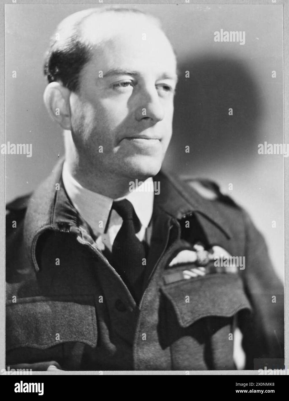 AIR COMMODORE D.L. THOMSON, DSO., DFC. - Air Commodore DONALD LESLIE THOMSON, DSO., DFC., a Base Commander in R.A.F. Bomber Command, was born in India in 1903 and educated at Dulwich College. He was a cadet at the R.A.F. College, Cranwell. In October 1942 he was awarded the D.F.C. for his work in bombing attacks. The citation to the D.S.O. awarded in September 1944 stated that he had taken part in attacks against some of the most heavily defended German targets. 'He has displayed excellent qualities of leadership, and his perfect example of coolness and cheerful courage has been an inspiration Stock Photo