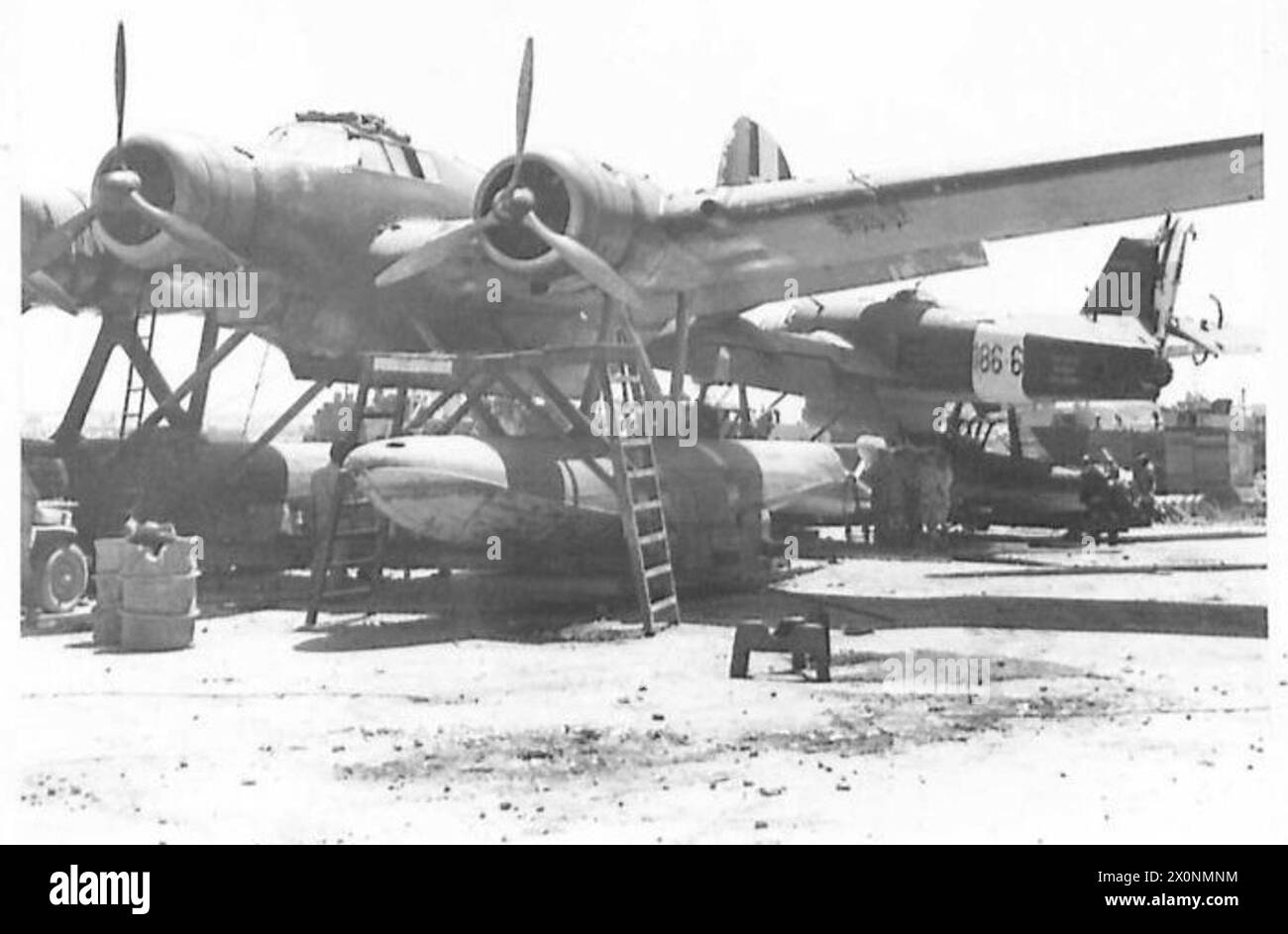 THE CAPTURED BASE OF AUGUSTA - Two of the Fiat seaplanes left by the Italians Photographic negative , British Army Stock Photo