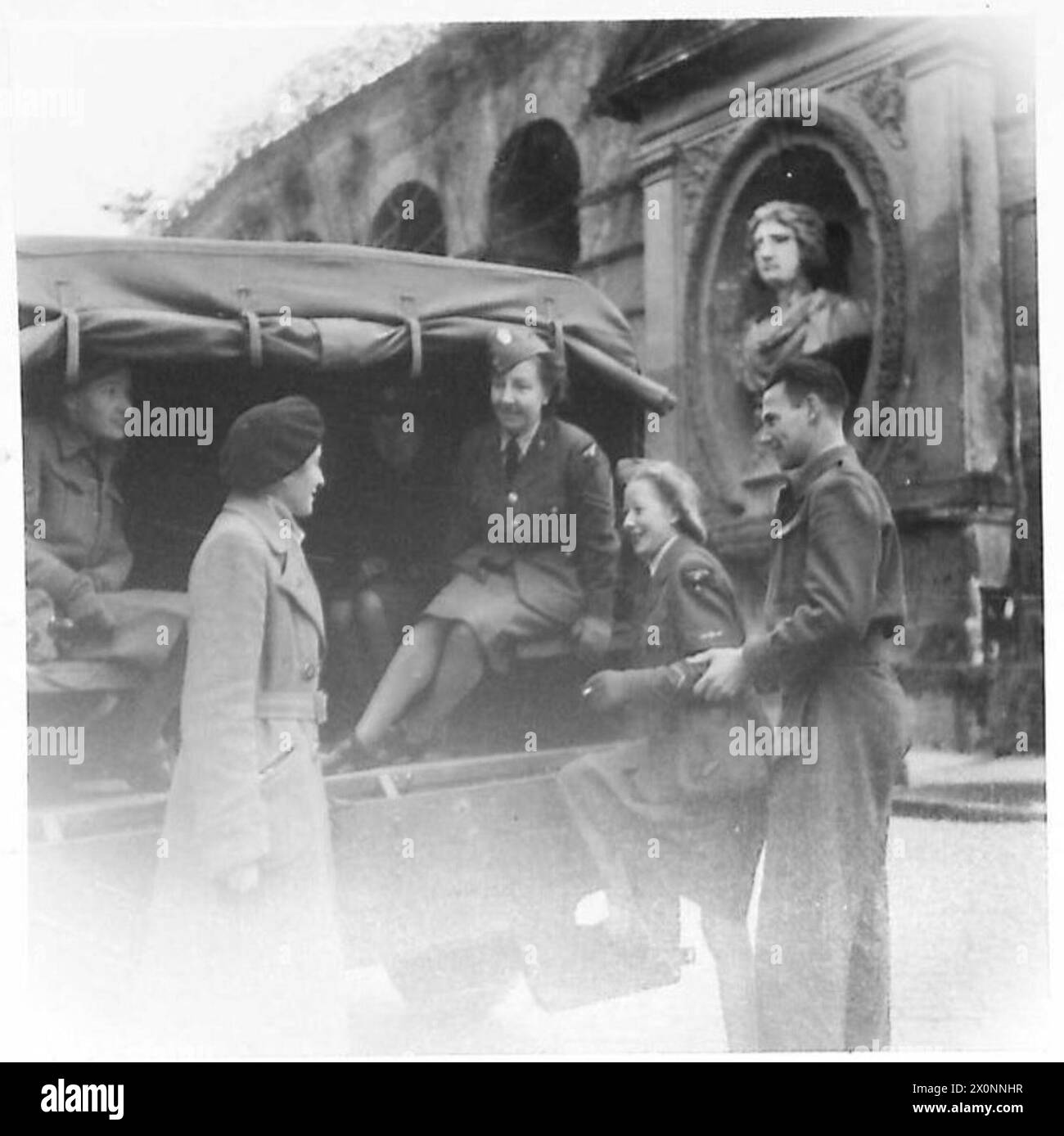 Y.W.C.A. HOTEL - Gladys and Ruby join a tour party, which is conducted by a Roman lady, Miss Lelli. Photographic negative , British Army Stock Photo