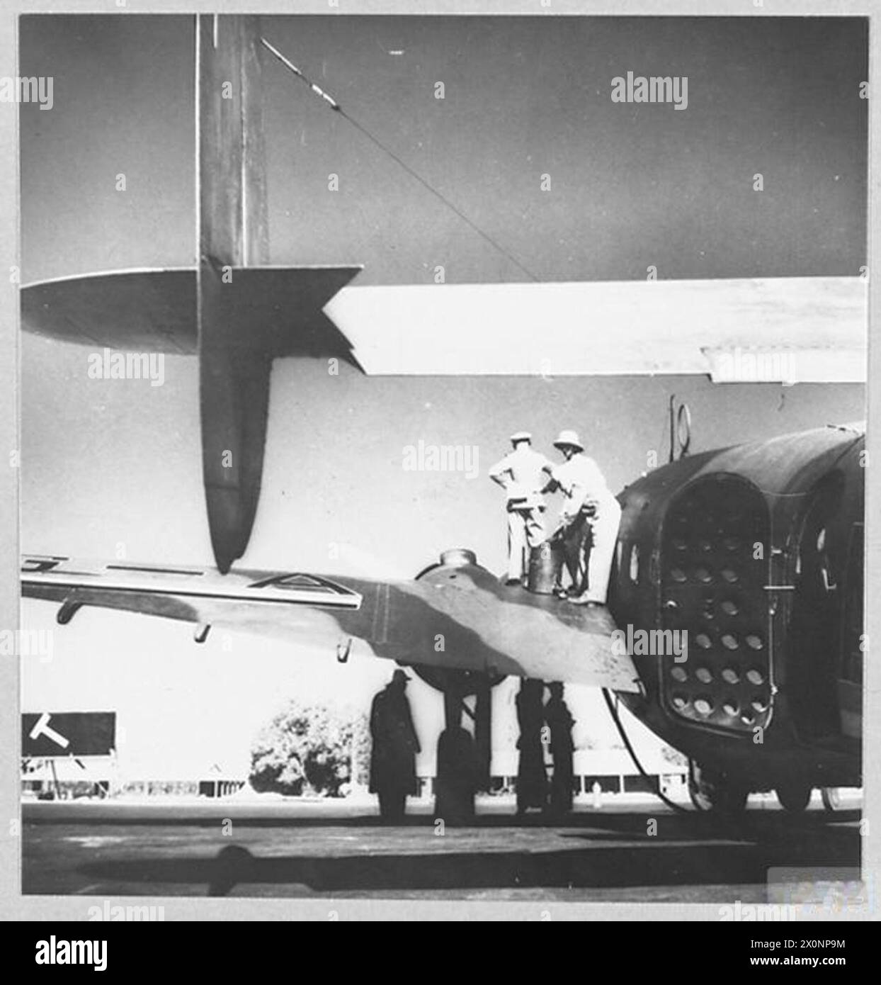 Refulled A British Overseas Airways Corporation Lodestar aircraft is refuelled ...